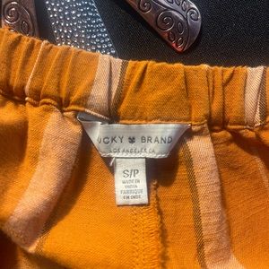 Tan striped ankle length jumper. Size SP